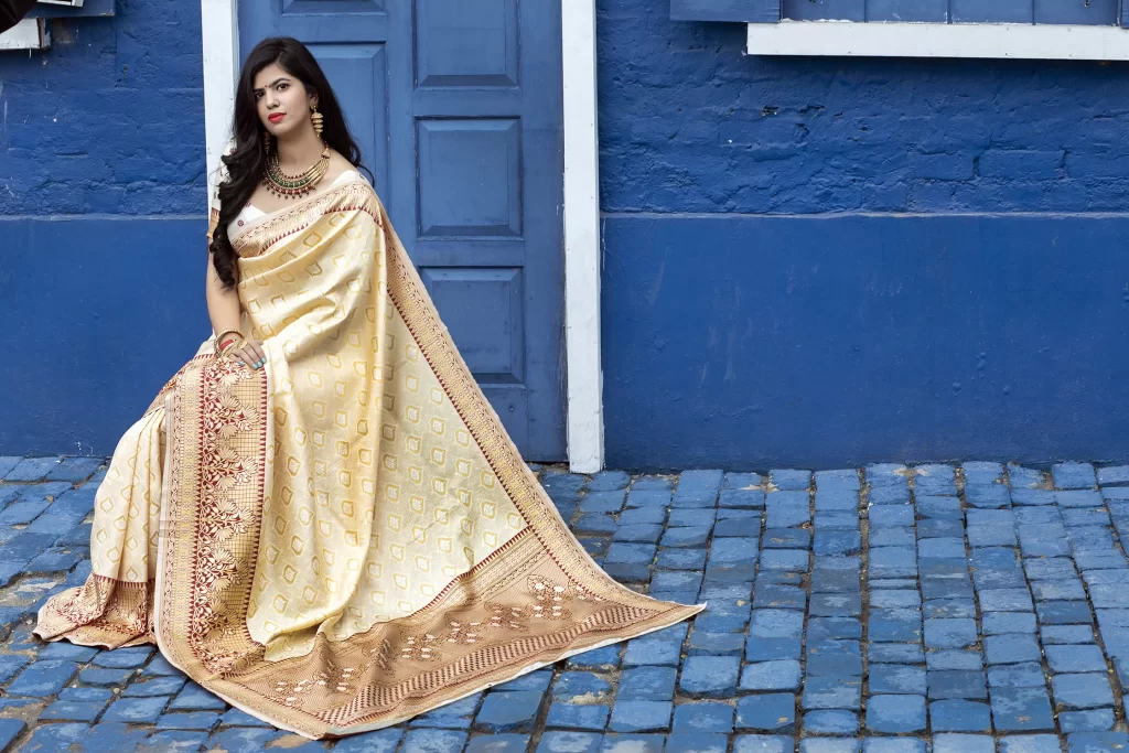 The Saree: A Timeless Garment That Continues to Captivate the World 1 The Saree Arresting Off-White Colored Festive Wear Woven Banarasi Silk Saree