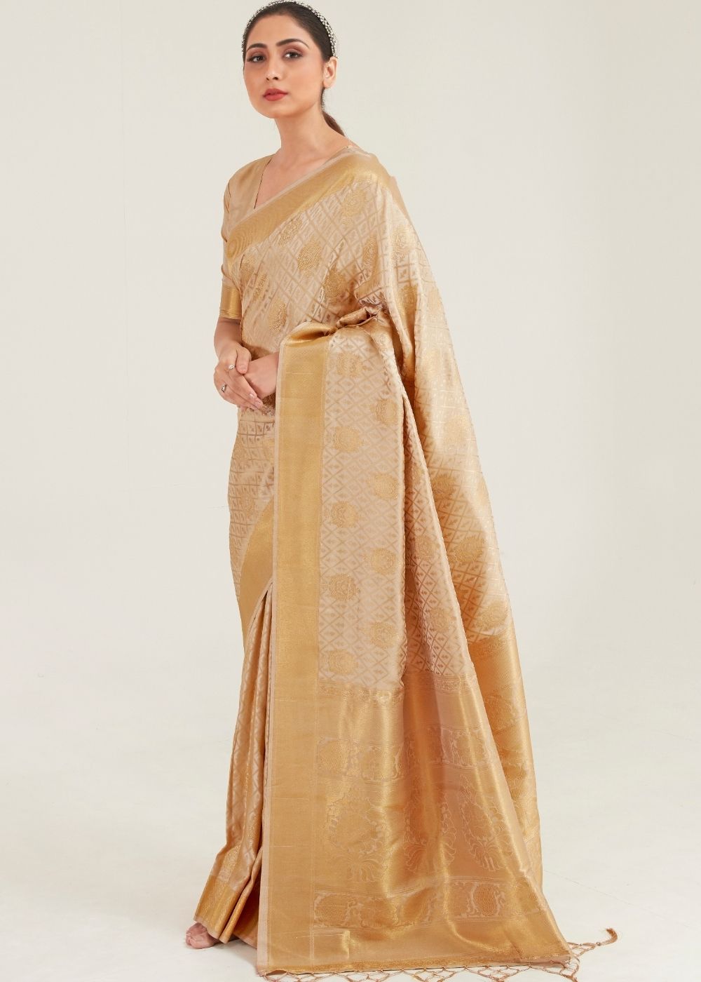 Unveiling Elegance: The Timeless Allure of Beige Sarees