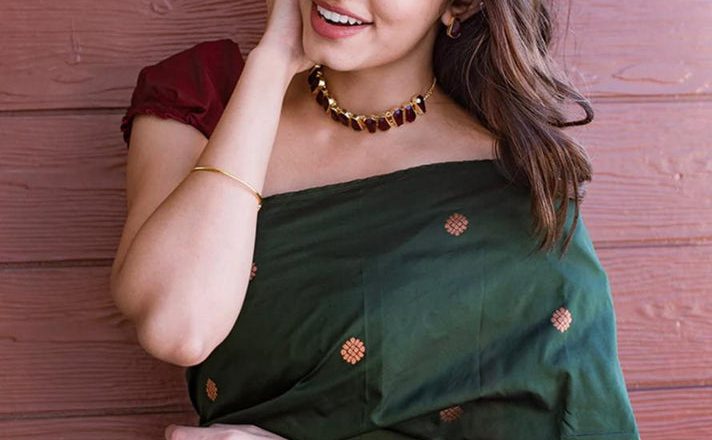 The Enchanting Allure of the Dark Green Saree: A Style Guide