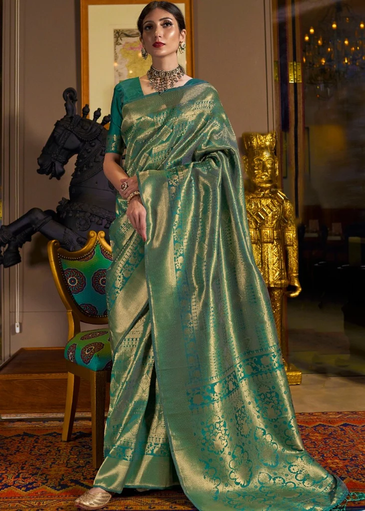 The Enchanting Embrace of Green: A Guide to Designer Green Sarees 1 designer green saree