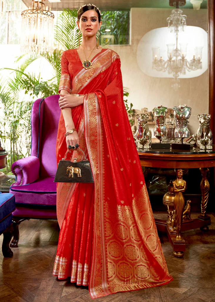 The Enchanting World of Red Sarees: Designs to Dazzle for Every Occasion 1 red colour saree design