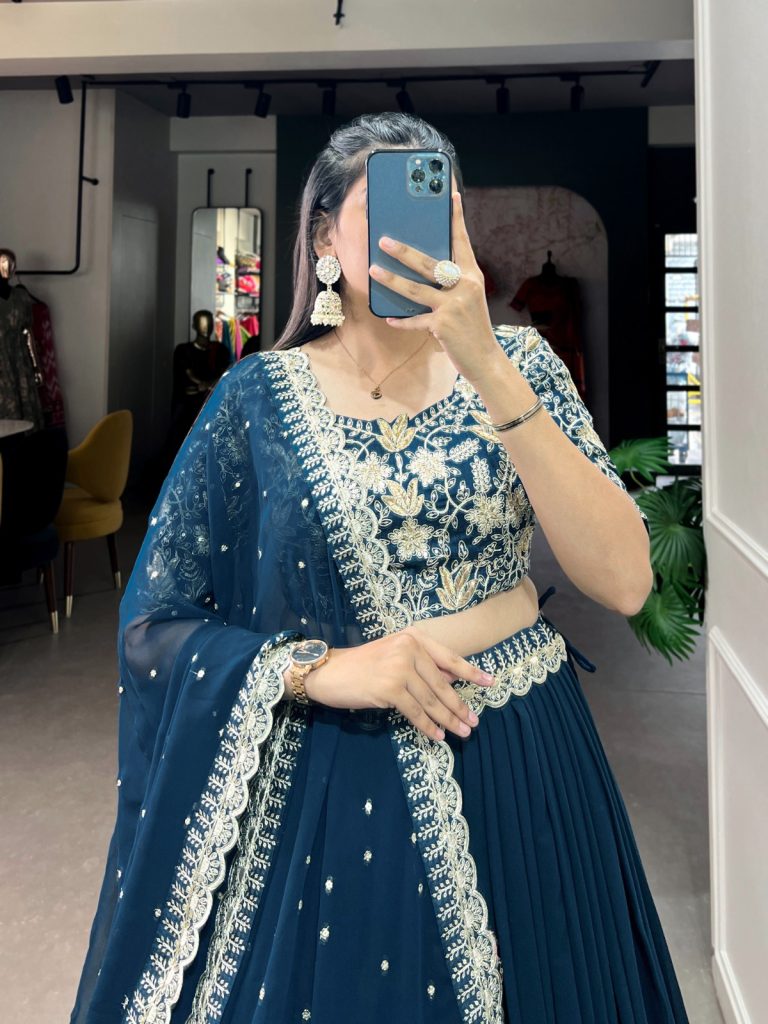 Be the Vision in Teal: A Look at the Exquisite Georgette Lehenga Choli with Banglory Blouse 1 Teal Georgette Lehenga Choli with Embroidered Banglory Blouse, Sequins & Threadwork