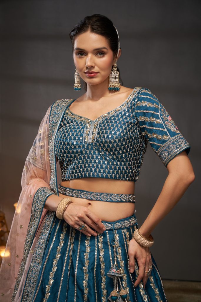 Embrace Enchantment: The Teal Pure Silk Bridal Lehenga Set for the Modern Maharani 1 Teal Pure Silk Bridal Lehenga Choli Dupatta Set with Moti, Zarkan & Heavy Sequin Embroidery