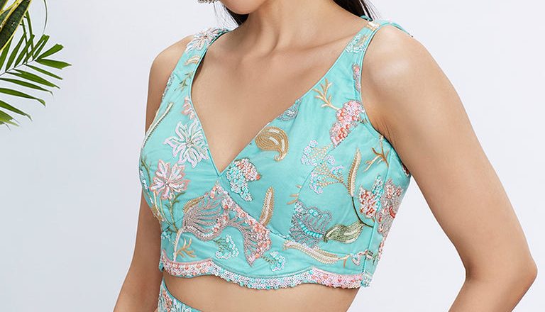 Be the Radiant Star: A Mesmerizing Turquoise Blue Sequin Embroidered Lehenga Choli Set