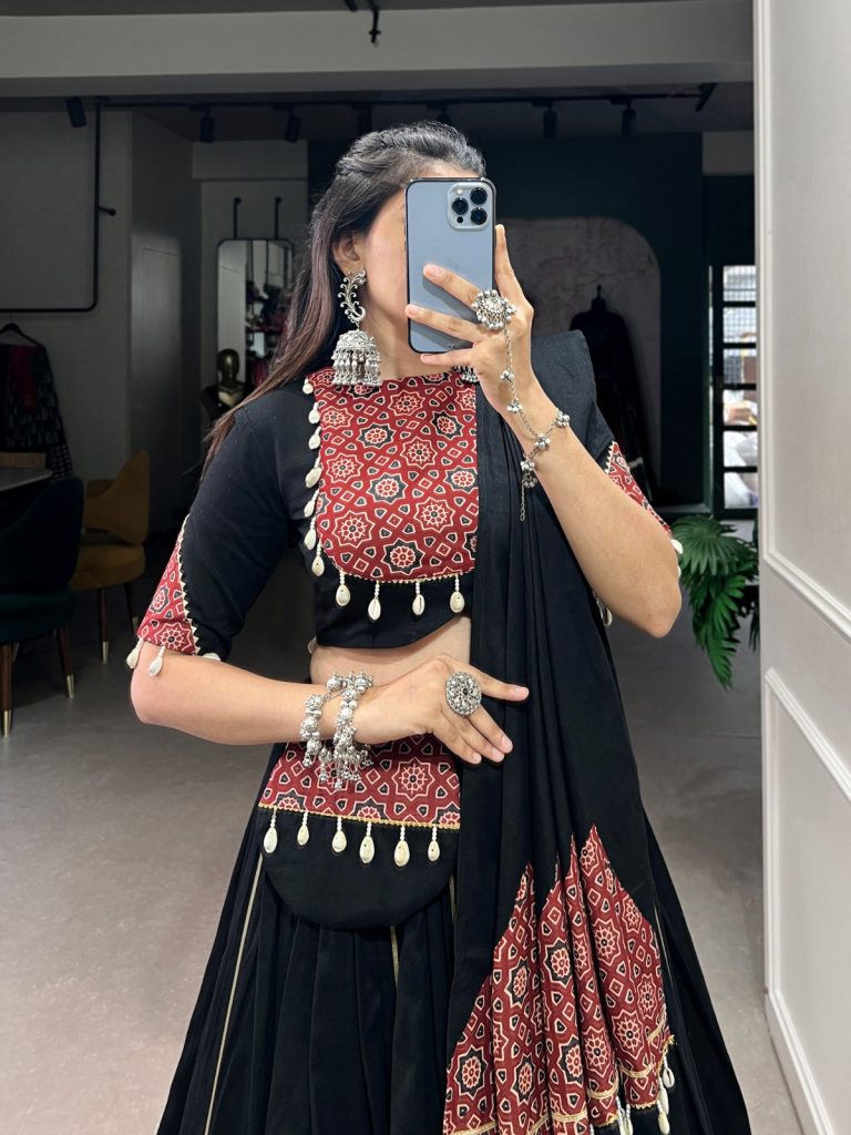 Navratri Collection 2024: Make a Bold Statement with Our Black Lehenga 1 Black Navratri Lehenga Choli with Printed and Gota Patti Embellishments