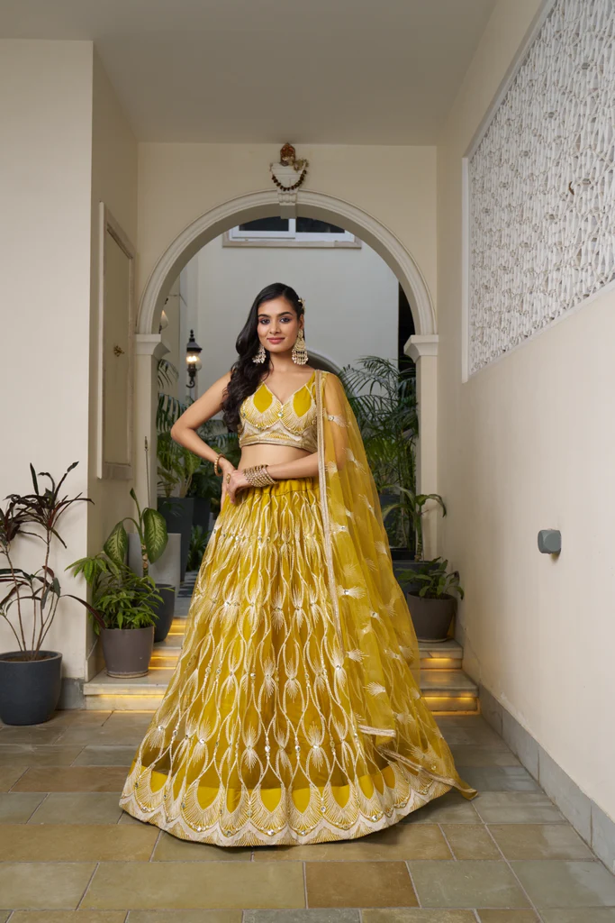 Mustard Yellow Elegant Butterfly Net Lehenga: A Timeless Addition to Your Ethnic Wardrobe 1 Mustard Yellow Elegant Butterfly Net Lehenga with Intricate Embroidery